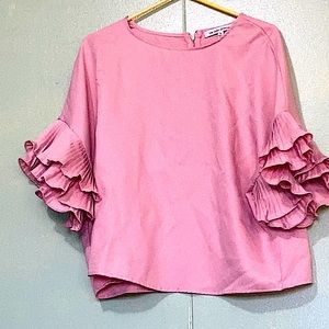 Pink ruffled top